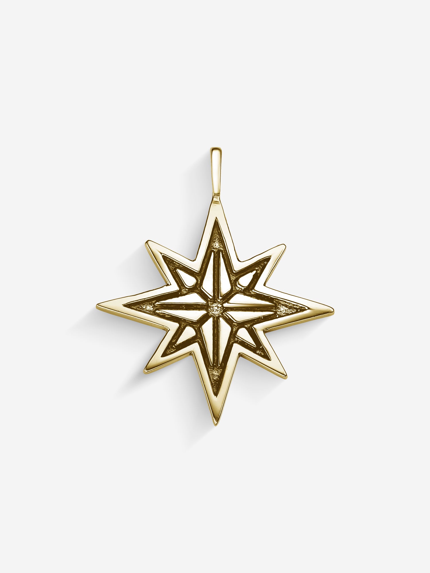 MATERIAL: PRATA BANHADA A OURO | Pingente North em Prata 925 banhada a Ouro 18k